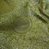 Olive Green Kanjivaram Silk Saree With Mayil Chakra And Floral Weaving