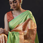 Pastel Peach Tissue Kanjivaram Silk Saree With Floral Jaal Weaving