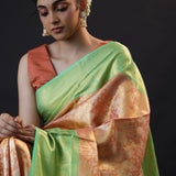 Pastel Peach Tissue Kanjivaram Silk Saree With Floral Jaal Weaving