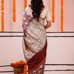 Athletic Maroon Banarasi Silk Saree With Floral Jaal Work