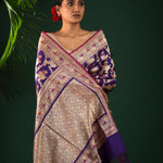 Regalia Purple Banarasi Silk Saree With Floral-Peacock Motifs