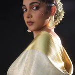 Pastel Off-White Tissue Kanjivaram Silk Saree With Jaal Weaving