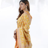 Saffron Yellow Banarasi Silk Saree With Floral Design
