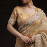 Light Orange Tissue Designer Saree With Floral Embroidery
