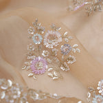 Light Orange Tissue Designer Saree With Floral Embroidery