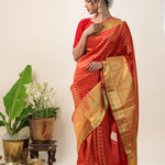 Orange Red Kanjivaram Silk Saree With Floral Buttis