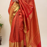 Orange Red Kanjivaram Silk Saree With Floral Buttis