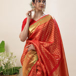 Orange Red Kanjivaram Silk Saree With Floral Buttis