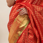 Orange Red Kanjivaram Silk Saree With Floral Buttis