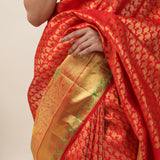 Orange Red Kanjivaram Silk Saree With Floral Buttis
