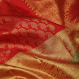Orange Red Kanjivaram Silk Saree With Floral Buttis