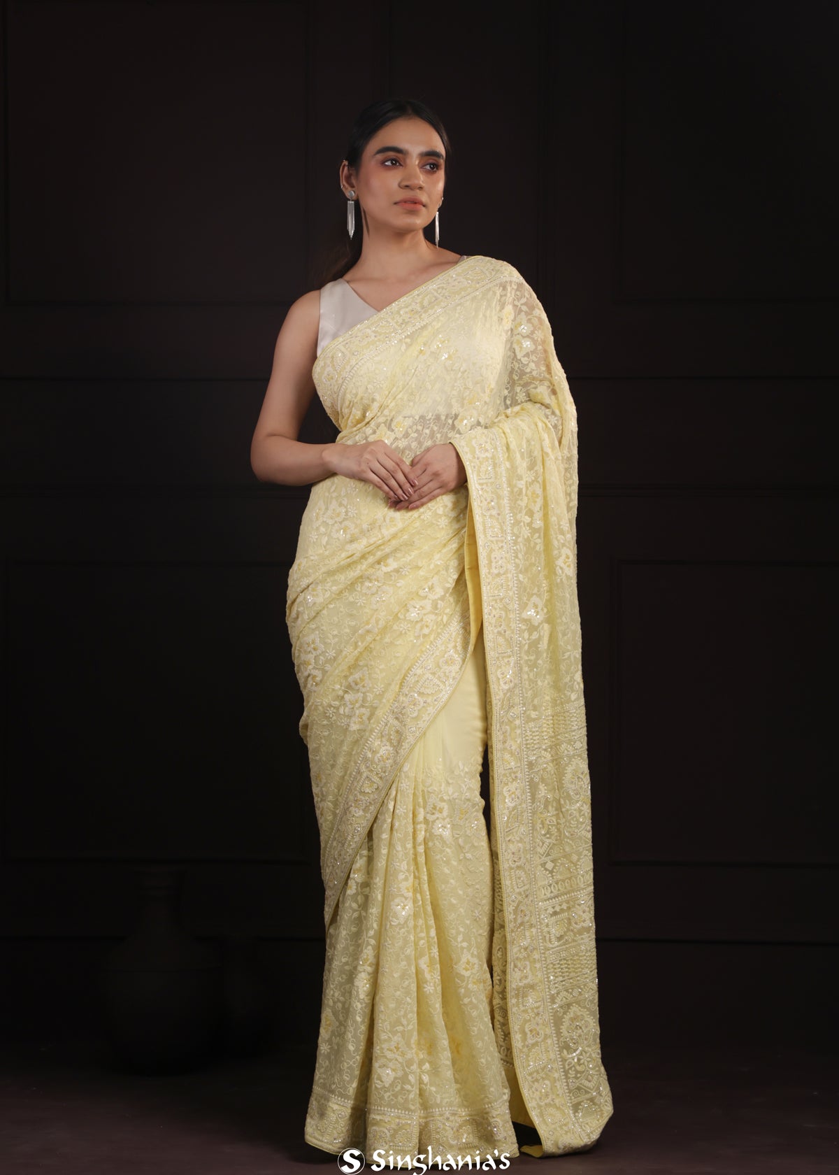 Light Khaki Yellow Georgette Saree With Hand Embroidery