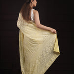 Light Khaki Yellow Georgette Saree With Hand Embroidery