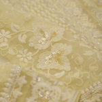 Light Khaki Yellow Georgette Saree With Hand Embroidery