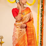 Pastel Peach-Gold Tissue Kanjivaram Saree With Floral Weaving