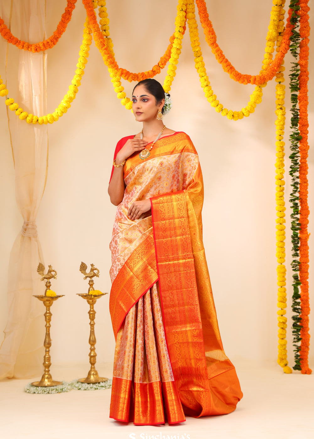 Pastel Peach-Gold Tissue Kanjivaram Saree With Floral Weaving
