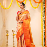 Pastel Peach-Gold Tissue Kanjivaram Saree With Floral Weaving
