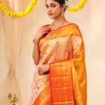 Pastel Peach-Gold Tissue Kanjivaram Saree With Floral Weaving