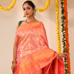 Melon Peach Tissue Kanjivaram Saree With Floral Weaving