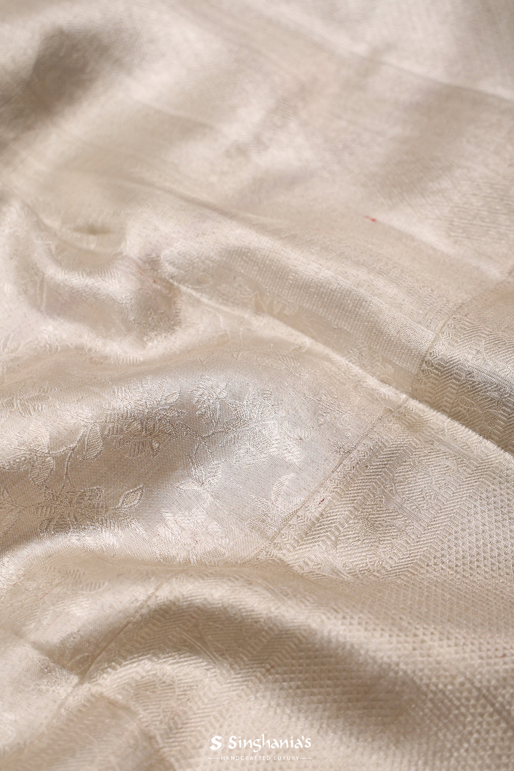 Bright Silver Tissue Kanjivaram Saree With Floral Weaving