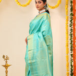 Aqua Blue Kanjivaram Silk Saree With Floral-Fauna Weaving