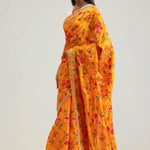 Amber Yellow Jaali Crafted Organza Saree
