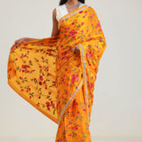 Amber Yellow Jaali Crafted Organza Saree