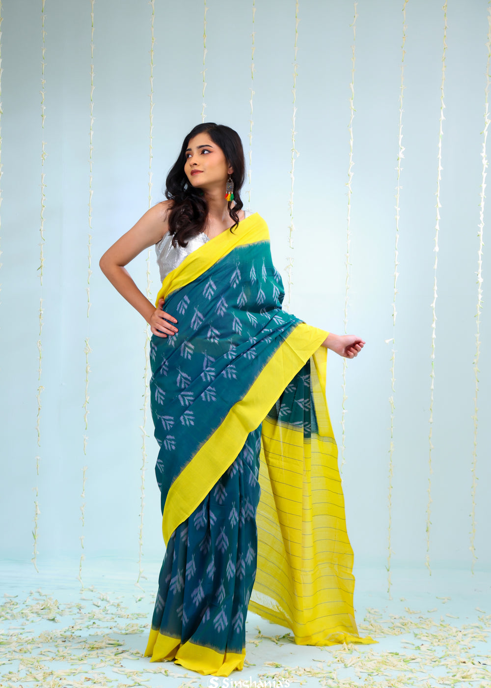 Peacock Green Ikkat Cotton Saree With Contrast Border