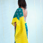 Peacock Green Ikkat Cotton Saree With Contrast Border