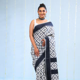 Merino White Ikkat Cotton Saree With Black Pattern