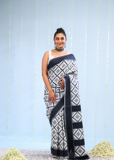 Merino White Ikkat Cotton Saree With Black Pattern