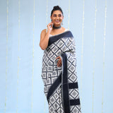 Merino White Ikkat Cotton Saree With Black Pattern