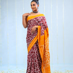 Marigold Orange Ikkat Cotton Saree With Traditional Design