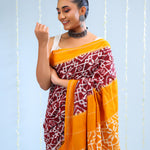 Marigold Orange Ikkat Cotton Saree With Traditional Design
