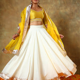 Mustard Yellow Blouse Lehenga With Ivory Skirt And Silver Border
