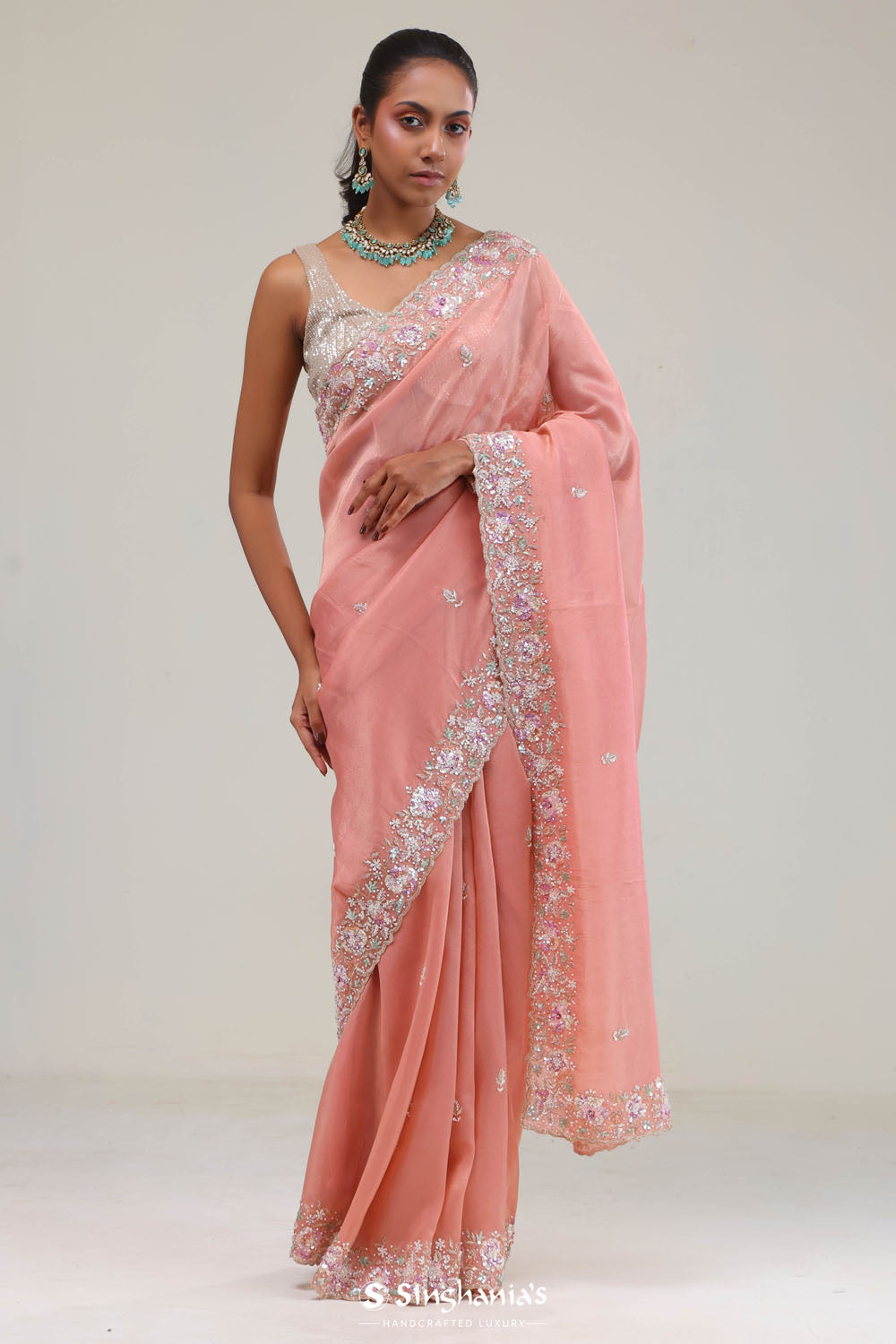 Apricot Peach Crafted Jaali Tissue Saree