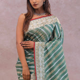 Pale Mint Green Tissue Banarasi Silk Saree With Strap Designs
