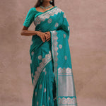 Teal Blue Banarasi Saree With Gold And Silver Zari Border