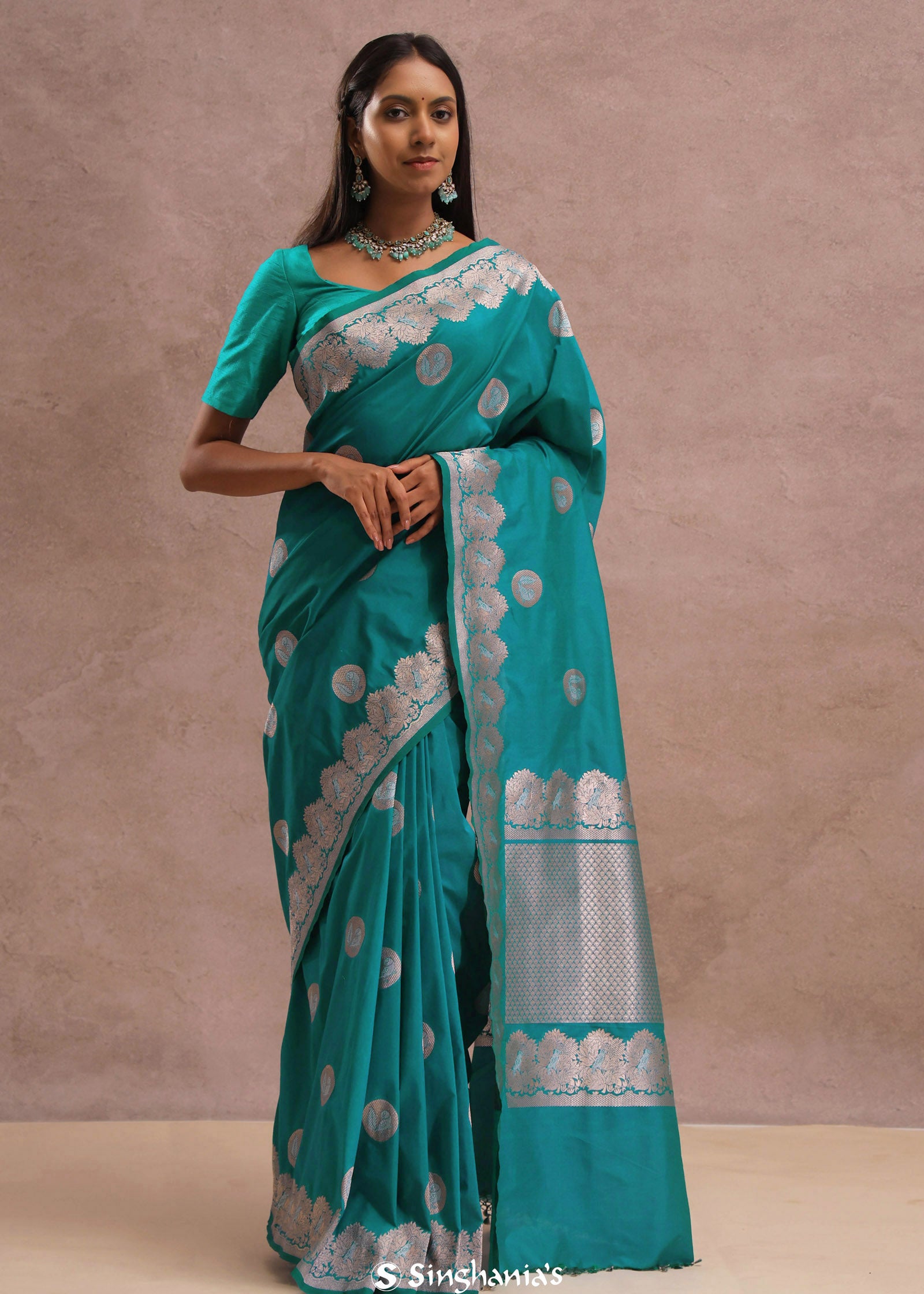 Teal Blue Banarasi Saree With Gold And Silver Zari Border