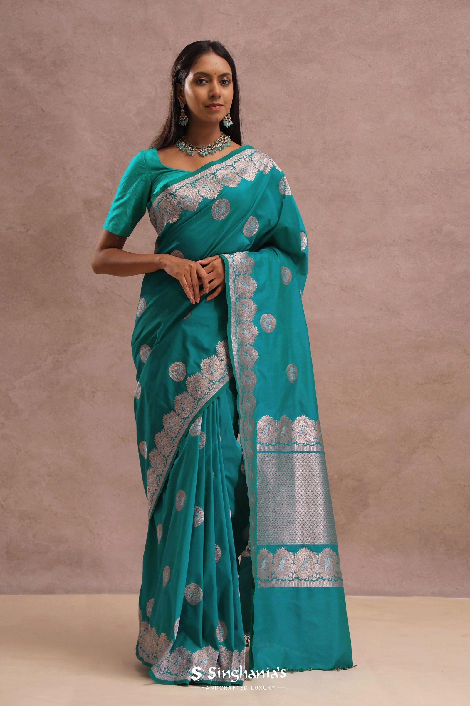 Teal Blue Banarasi Saree With Gold And Silver Zari Border