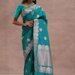 Teal Blue Banarasi Saree With Gold And Silver Zari Border