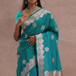 Teal Blue Banarasi Saree With Gold And Silver Zari Border