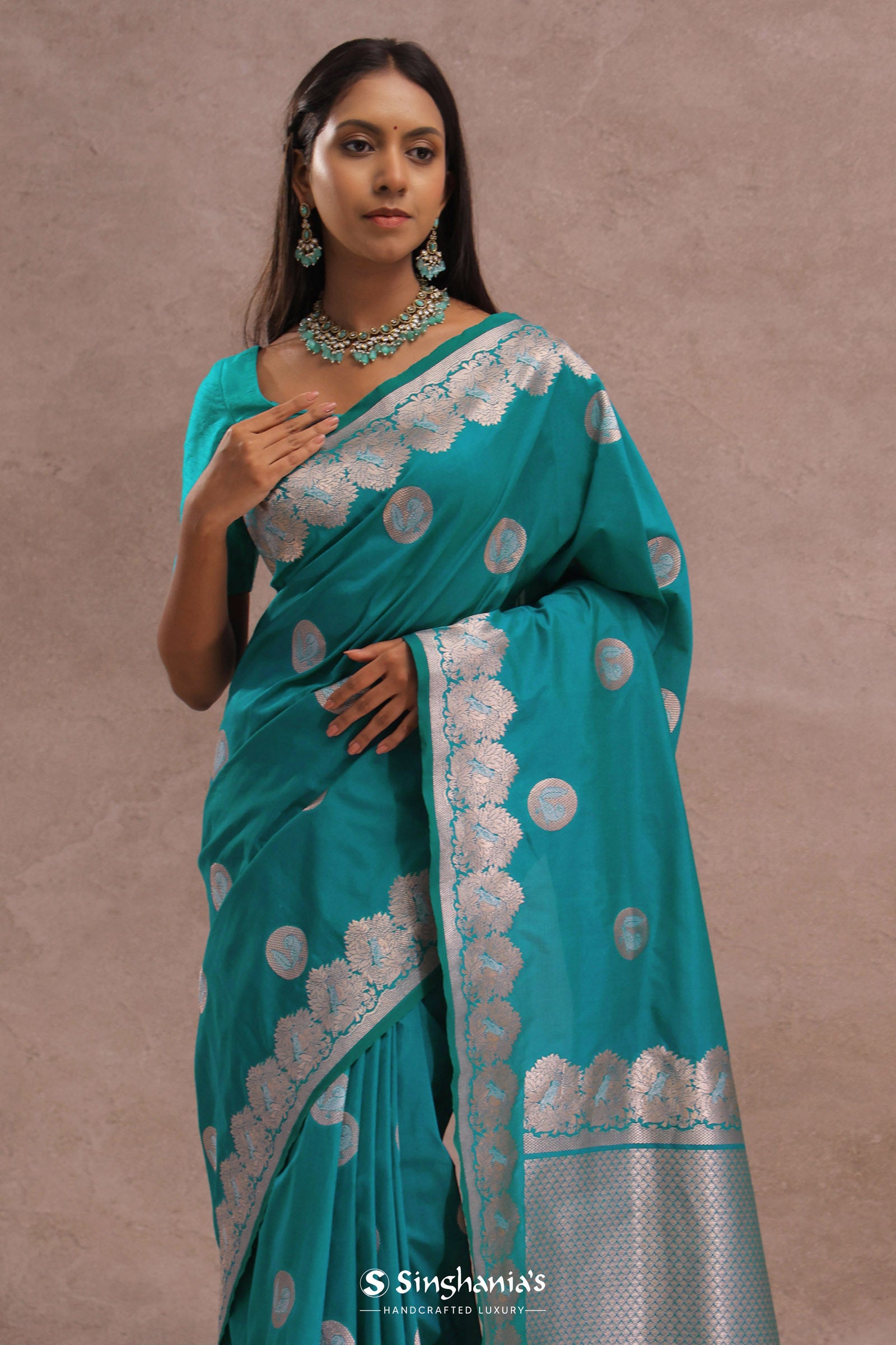 Teal Blue Banarasi Saree With Gold And Silver Zari Border