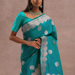 Teal Blue Banarasi Saree With Gold And Silver Zari Border