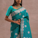 Teal Blue Banarasi Saree With Gold And Silver Zari Border