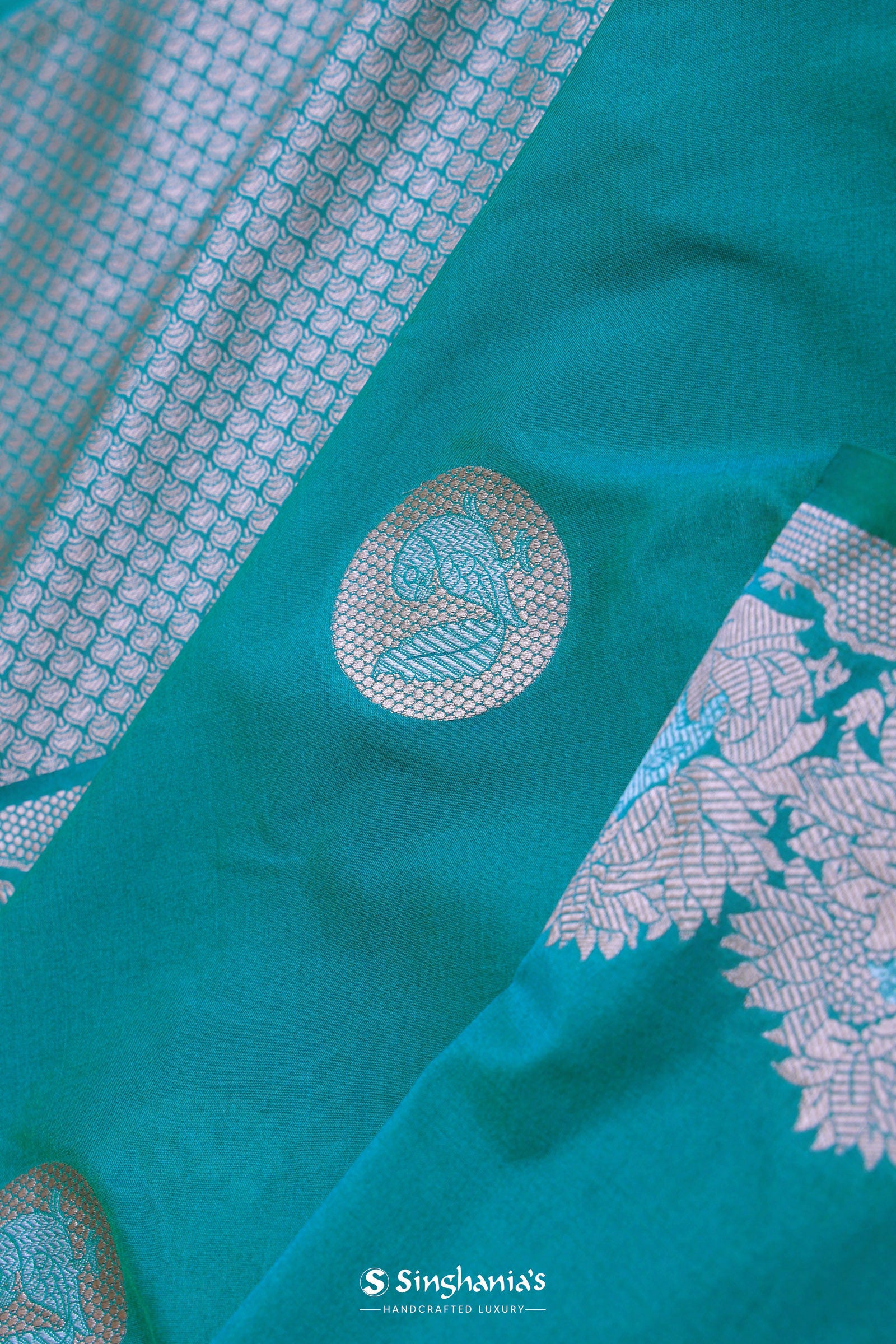 Teal Blue Banarasi Saree With Gold And Silver Zari Border