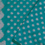 Teal Blue Banarasi Saree With Gold And Silver Zari Border