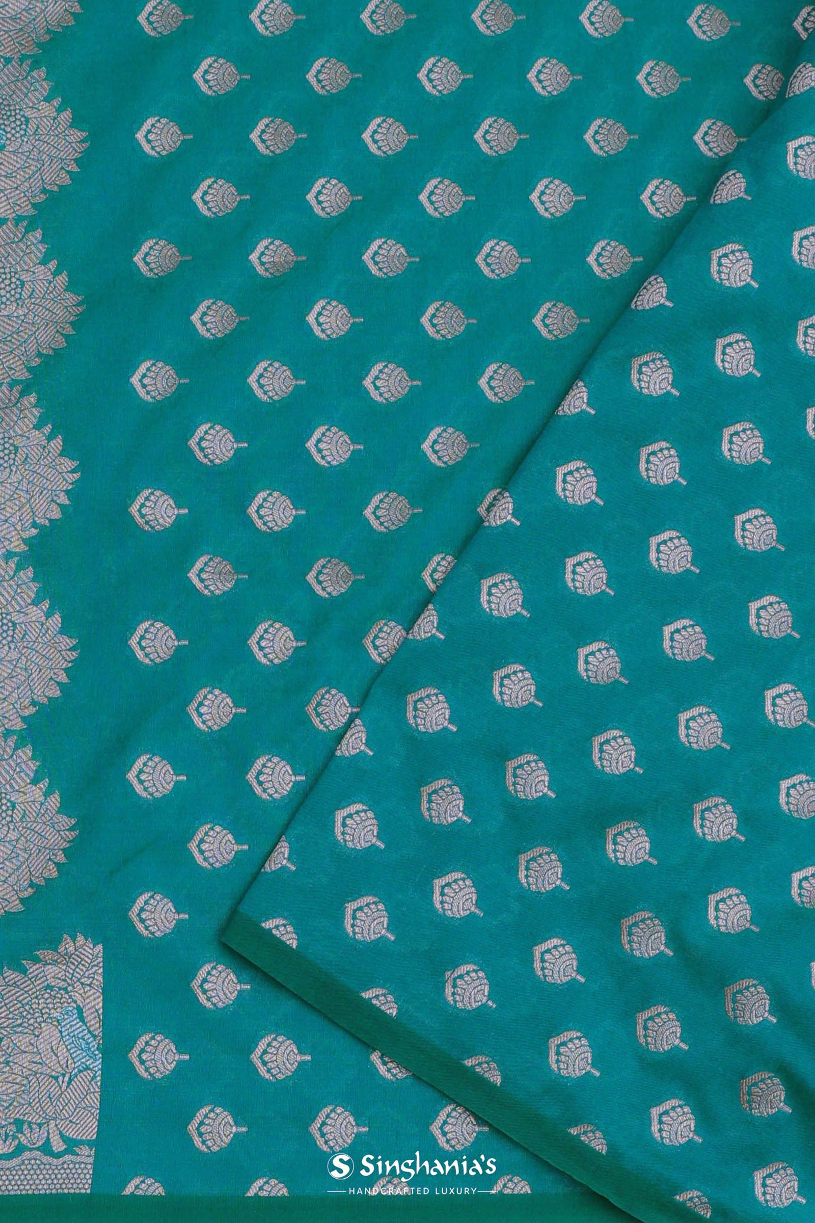 Teal Blue Banarasi Saree With Gold And Silver Zari Border