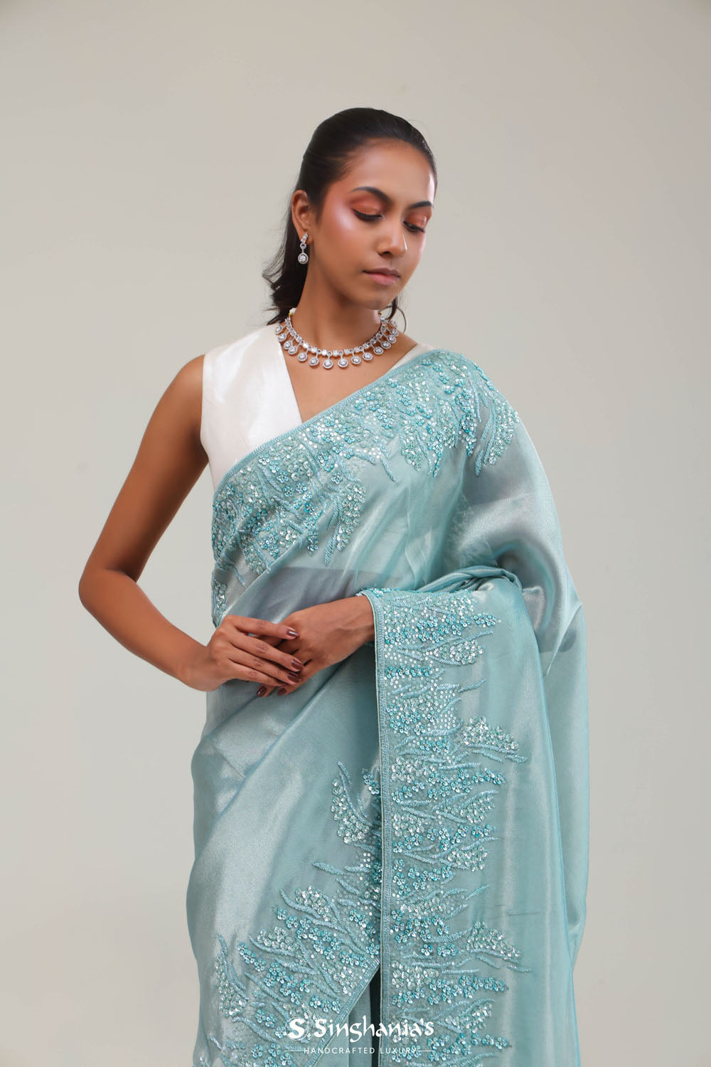 Light Turquoise Tissue Saree With Embroidery Detail