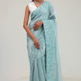Light Turquoise Tissue Saree With Embroidery Detail